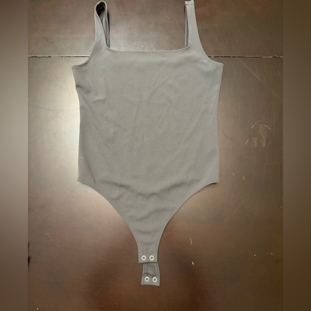 Grey body suit